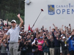 Nick Taylor reacts after winning the Canadian Open championship on the fourth playoff hole against Tommy Fleetwood in Toronto on Sunday, June 11, 2023. Taylor's putter flip after winning the RBC Canadian Open was the exclamation point on arguably the best year in Canadian golf history.