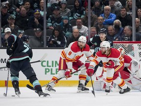 Chris Tanev and Noah Hanifin