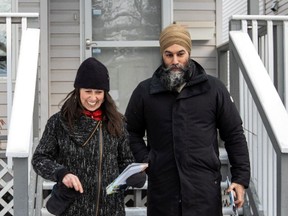 NDP Leader Jagmeet Singh and NDP candidate for Edmonton Centre, Trisha Estabrooks knock on doors in Edmonton during the NDP caucus retreat, Monday, Jan. 22, 2024.