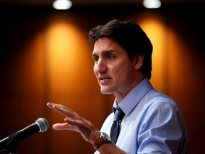 Prime Minister Justin Trudeau speaks to the Liberal caucus during a winter retreat on Parliament Hill in Ottawa on Thursday, Jan. 25, 2024.