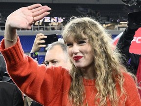 Taylor Swift waves after the AFC Championship NFL football game between the Baltimore Ravens and the Kansas City Chiefs, Sunday, Jan. 28, 2024, in Baltimore.