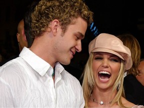 In this file photo taken on February 11, 2002 Britney Spears (R) arrives at the premiere of her film "Crossroads," with her boyfriend, singer Justin Timberlake in Los Angeles, CA.