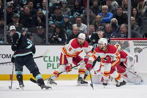 Chris Tanev and Noah Hanifin