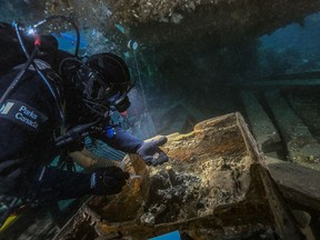More than 30 expeditions sought the wreck, to find only a few artifacts, graves and ghastly tales of cannibalism.