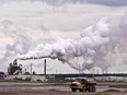 New research suggests Alberta's oilsands are releasing potentially hazardous compounds into the atmosphere at rates dozens of times higher than official estimates. A dump truck works near the Syncrude oilsands extraction facility near the city of Fort McMurray, Alta.