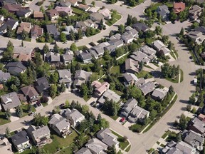 An aerial view of housing is shown in Calgary on June 22, 2013. New reports released this week offer a look at how the housing market finished in 2023.
