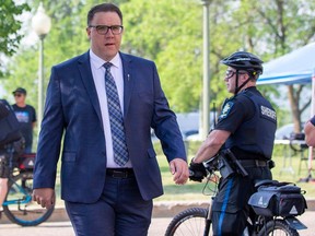 Jason Nixon, minister of community, seniors and social services walks in to Government House as Alberta Premier Danielle Smith prepares to announce her cabinet on Friday, June 9, 2023 in Edmonton.