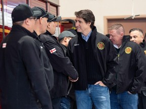 Prime Minister Justin Trudeau meets with first responders at the Eskasoni Fire Station on Feb. 22, 2024.