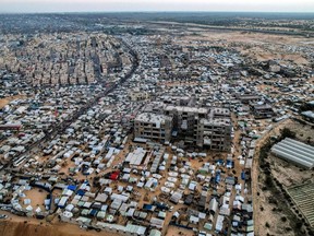 Aerial view shows the tent camps of displaced Palestinians in Rafah in the southern Gaza Strip close to the border with Egypt.