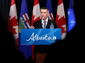 Finance Minister Nate Horner provides an update on Alberta’s finances and economy during a news conference at the Alberta legislature in Edmonton on Nov. 30, 2023.
