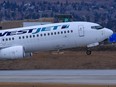 A WestJet Boeing 737 at the Calgary airport
