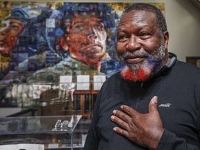 Former Canadian Armed Forces soldier Oral Virtue gestures as he recalls memories of his service during an interview at the Military Museums in Calgary, Monday, Feb. 12, 2024.