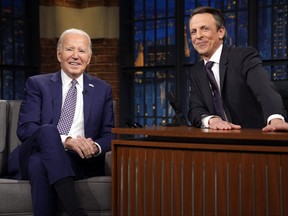 U.S. President Joe Biden talks with Seth Meyers during a taping of the "Late Night with Seth Meyers" Monday, Feb. 26, 2024, in New York.