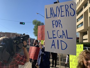 Around 40 defence lawyers picketed outside the Edmonton Law Courts on Sept. 2, 2022, in support of improved legal aid funding. The Alberta government announced changes to financial eligibility guidelines for legal aid on Feb. 14, 2024.