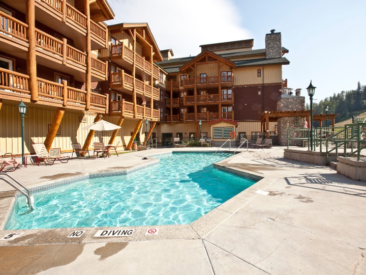  You can watch skiers and mountain bikers from the outdoor pool at Trickle Creek Lodge.