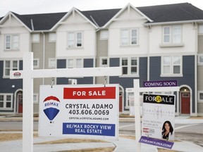 Houses for sale are shown in a new subdivision in Airdrie, Alta., Friday, Jan. 28, 2022.