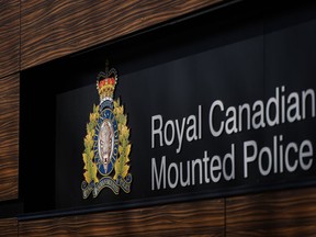 The RCMP logo is seen outside the force's 'E' division headquarters in Surrey, B.C., on Thursday, March 16, 2023. A train derailed on Monday afternoon in southern Alberta, with multiple cars coming on the track.