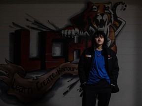 High schooler Aspen Cervo says he began thinking about a student walkout over the Alberta government's planned policies around transgender youth right after Premier Danielle Smith announced them last week. Cervo, 16, poses for a portrait at Leduc Composite High School, in Leduc, Alta., Tuesday, Feb. 6, 2024.