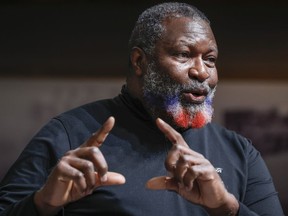 Former Canadian Armed Forces soldier Oral Virtue gestures as he recalls memories of his service during an interview at the Military Museums in Calgary, Monday, Feb. 12, 2024.
