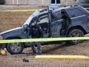 Damaged vehicle at a shooting scene at a southeast Calgary intersection