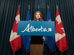 Premier Danielle Smith speaks to media at the McDougall Centre in Calgary on Thursday, February 1, 2024.