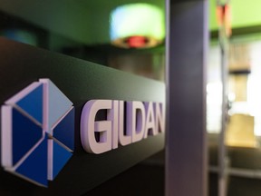 Gildan Activewear Inc. will release its fourth-quarter and full-year earnings before markets open on Wednesday and hold a conference call with financial analysts. The Gildan logo is seen outside their offices in Montreal, Monday, Dec. 11, 2023.