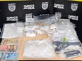 ALERT drugs firearm cash seized Calgary Cochrane