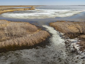 Still-frozen Keho Lake near Barons, Ab., on Monday, March 18, 2024.