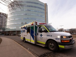 An Alberta Health Services emergency medical services ambulance is seen near the University of Alberta Hospital in Edmonton on March 22, 2022.