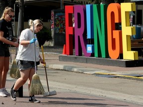 Crews clean up following the Edmonton International Fringe Theatre Festival on Aug. 28, 2023.
