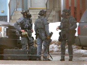 Calgary police tactical team members at a weapons call in Penbrooke