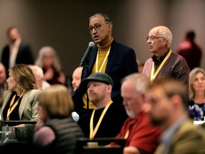 Edmonton Mayor Amarjeet Sohi asks Premier Danielle Smith a question during the Alberta Municipalities 2024 Spring Municipal Leaders' Caucus, in Edmonton Friday March 15, 2024.