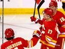 Calgary Flames forward Yegor Sharangovich scores on Pittsburgh Penguins goalie Tristan Jarry in second-period NHL action at the Scotiabank Saddledome in Calgary on Saturday, March 2, 2024.