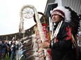 Chief Tony Alexis, of the Alexis Nakota Sioux Nations, prepares to participate in the traditional entrance of Indigenous leaders (Grand Entry of Chiefs), ahead of the arrival of Pope Francis, at Muskwa Park in Maskwacis, Alberta, Canada, on July 25, 2022. - Pope Francis will make a historic personal apology Monday to Indigenous survivors of child abuse committed over decades at Catholic-run institutions in Canada, at the start of a week-long visit he has described as a "penitential journey."