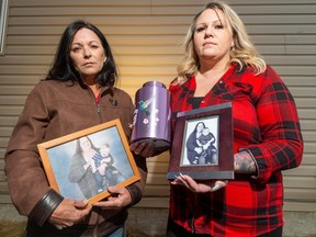Tracey McCleave, left, and Zina Hinkley are among those speaking out after the man who dismembered the body of their friend Treasa Lynn Oberly was spared jail time. The two hold pictures of Oberly as well as an urn containing her ashes.