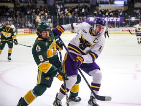 College standout Sam Morton, right, has signed a contract with the Calgary Flames for the 2024-25 campaign