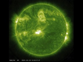 This image provided by NASA shows the Sun seen from the Solar Dynamics Observatory (SDO) satellite on Saturday, March 23, 2024. Space weather forecasters have issued a geomagnetic storm watch through Monday, March 25, 2024, saying an ouburst of plasma from a solar flare could interfere with radio transmissions on Earth and make for great aurora viewing. There's no reason for the public to be concerned, according to the alert issued Saturday night by NOAA's Space Weather Prediction Center in Boulder, Colo. (NASA via AP)
