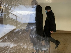 Joseph Donald Skelly, right, leaves court with his lawyer on Thursday, March 7, 2024, after being sentenced to house arrest for dismembering the body of Treasa Lynn Oberly.