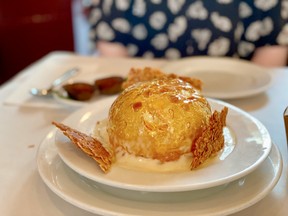 Ile flottante, a.k.a. floating island is an affordable, show-stopping dessert at Montreal’s L’Express.