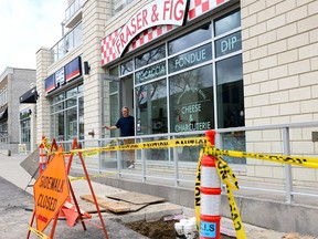 Cam Fraser, owner of Fraser & Fig in Marda Loop, is still dealing with construction in the area in Calgary. Photo taken on Friday, April 12, 2024.