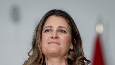 Deputy Prime Minister and Minister of Finance, Chrystia Freeland listens to a speaker during a news conference for a housing announcement in Vancouver, B.C., on March 27, 2024.