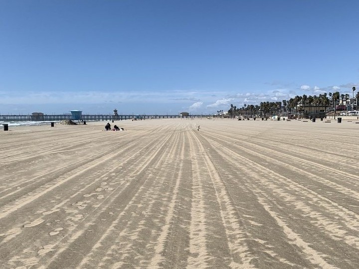  The wide swath of sand runs for miles at Huntington Beach. Photo, Michele Jarvie