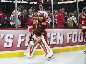 Matt Davis of the Denver Pioneers celebrates against the Boston College Eagles in the third period during the NCAA Men's Hockey Frozen Four Championship game at Xcel Energy Center on April 13, 2024 in St Paul, Minnesota. The Pioneers defeated the Eagles 2-0.