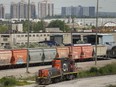 The country's two biggest railway companies will report their first-quarter results this week. CN rail trains are shown at the CN MacMillan Yard in Vaughan, Ont., on Monday, June 20, 2022.