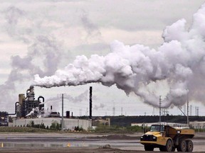 Oilsands operator Syncrude Canada Ltd. has been ordered to pay a $390,000 penalty in relation to the death of a worker in 2021. A dump truck works near the Syncrude oil sands extraction facility near the city of Fort McMurray, Alta., on June 1, 2014.
