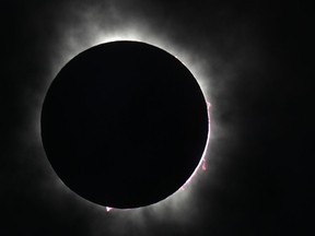 FILE - The moon covers the sun during a total solar eclipse, as seen from Fort Worth, Texas, Monday, April 8, 2024.