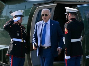 U.S. President Joe Biden steps off Marine One upon arrival at Soldier Field Landing Zone in Chicago, Ill., on Wednesday, May 8, 2024.