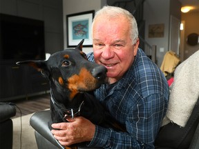 Craig Campbell with his dog Night, who saved him from a grizzly