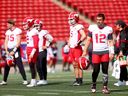 Calgary Stampeders QB Jake Maier with other QBs during the opening of main camp at McMahon Stadium in Calgary on Sunday, May 12, 2024.