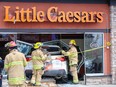 Car drives into a Little Caesars in northwest Calgary
